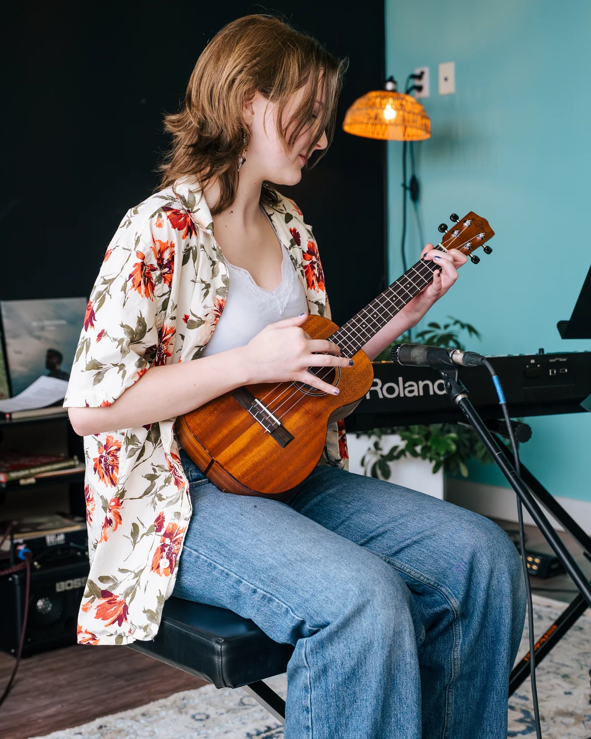 Ukulele student playing in a teaching room at Resonate Music School in Edmonton